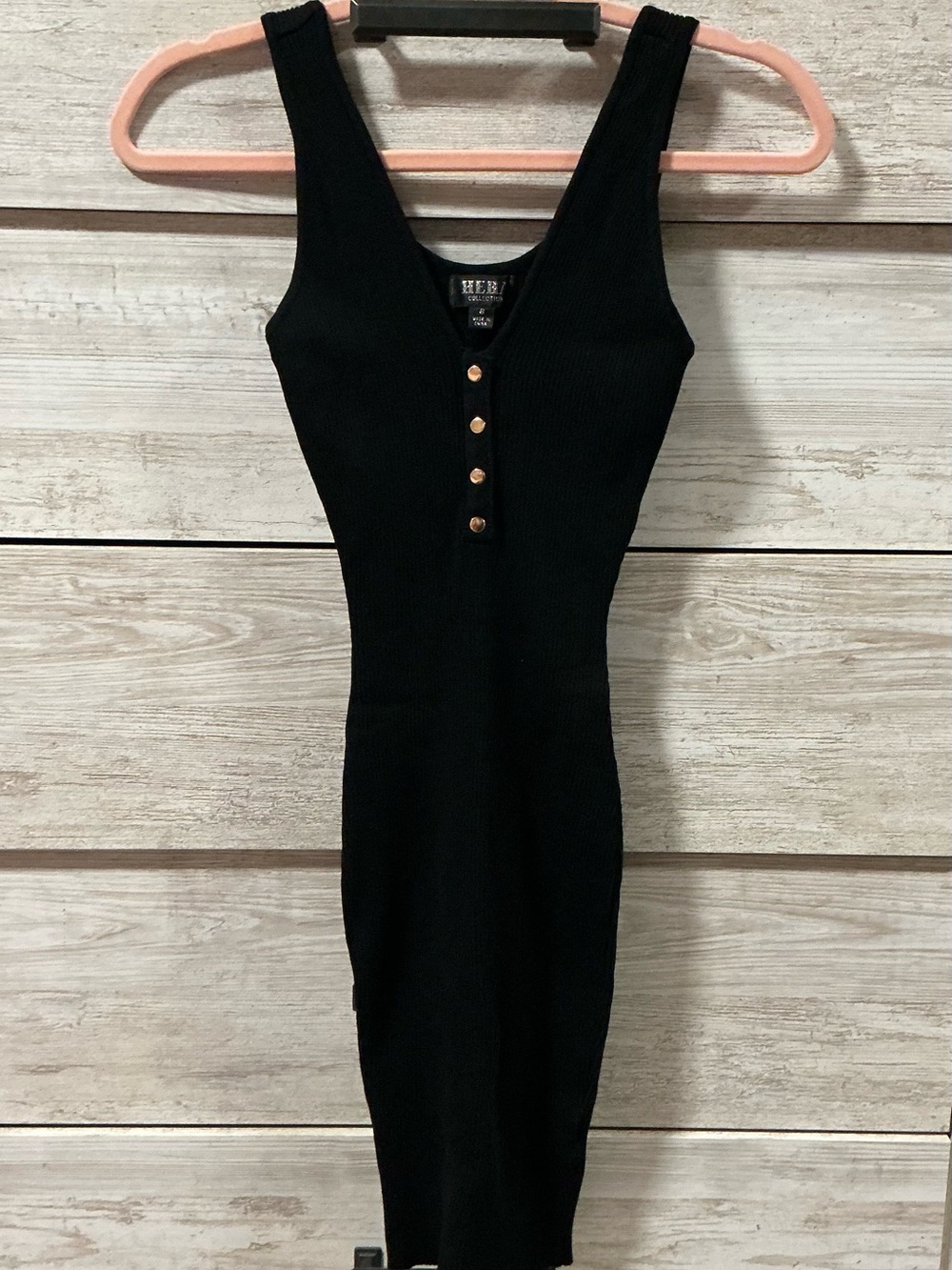 Sleeveless Black Ribbed Mini Dress with Gold Button Accents